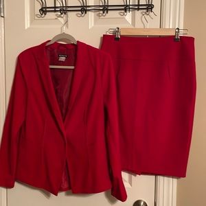 Woman’s red business suit